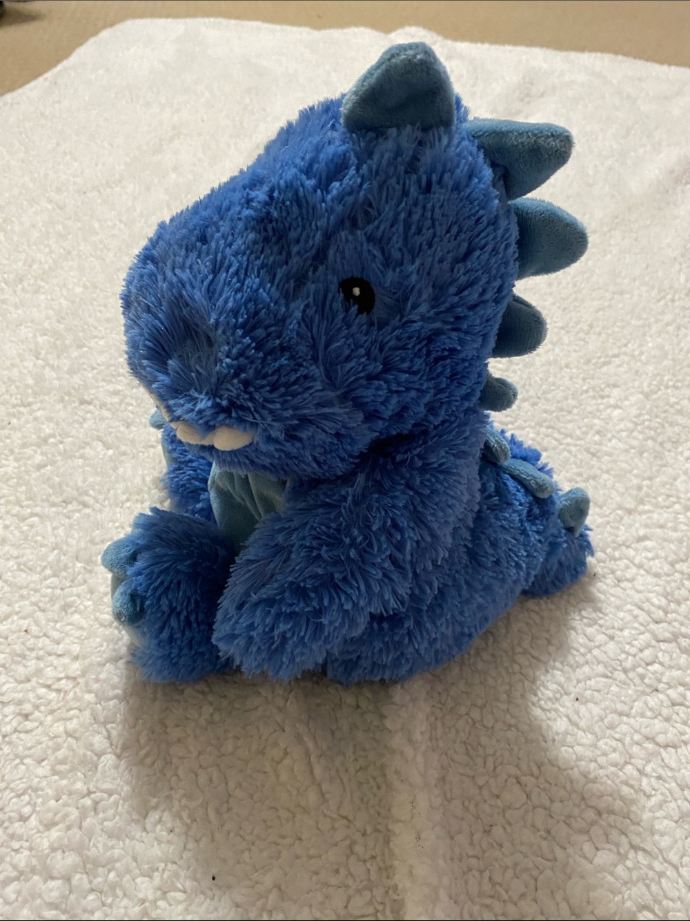 WARMIES blue dinosaur